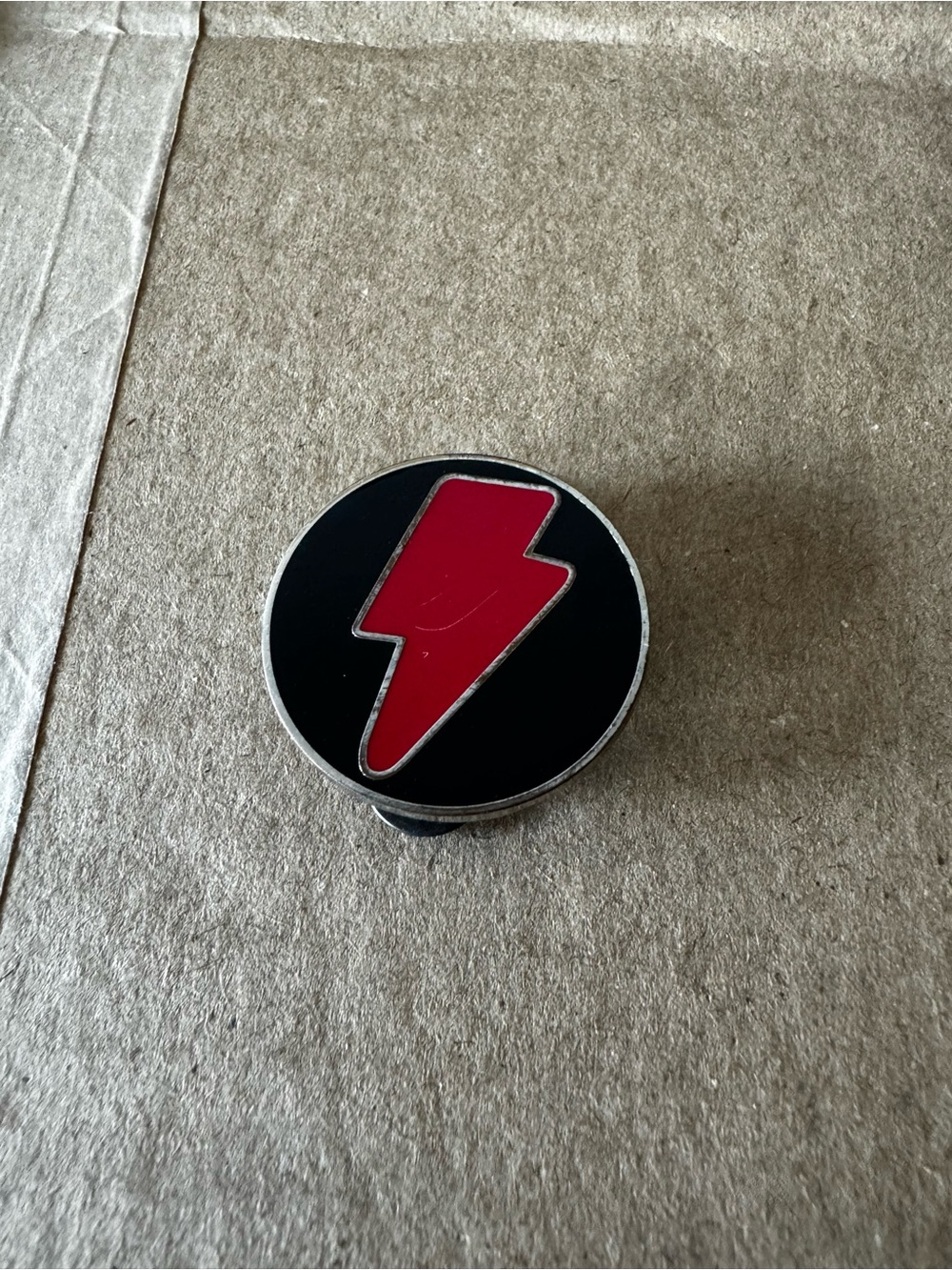 Coach Black and Red Lightning Bolt Souvenir Pin